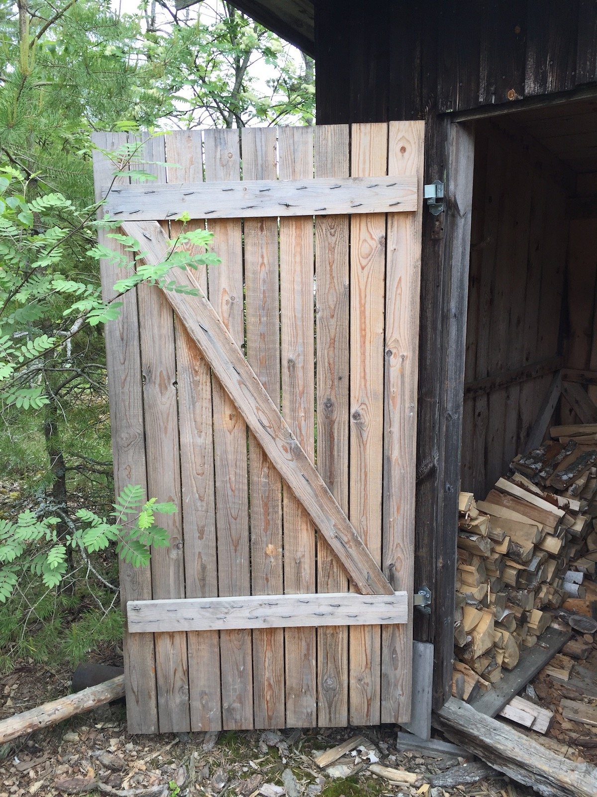 wood shed door with diagonal